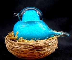 Glass bird in nest